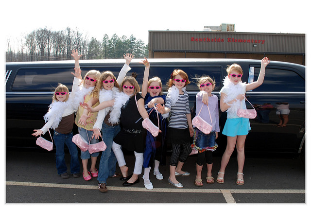 Young girls dress up limo ride birthday party