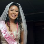 Sharon on her Hen Night in bride sash and veil