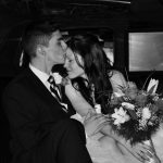 Couple Kissing inside Limousine